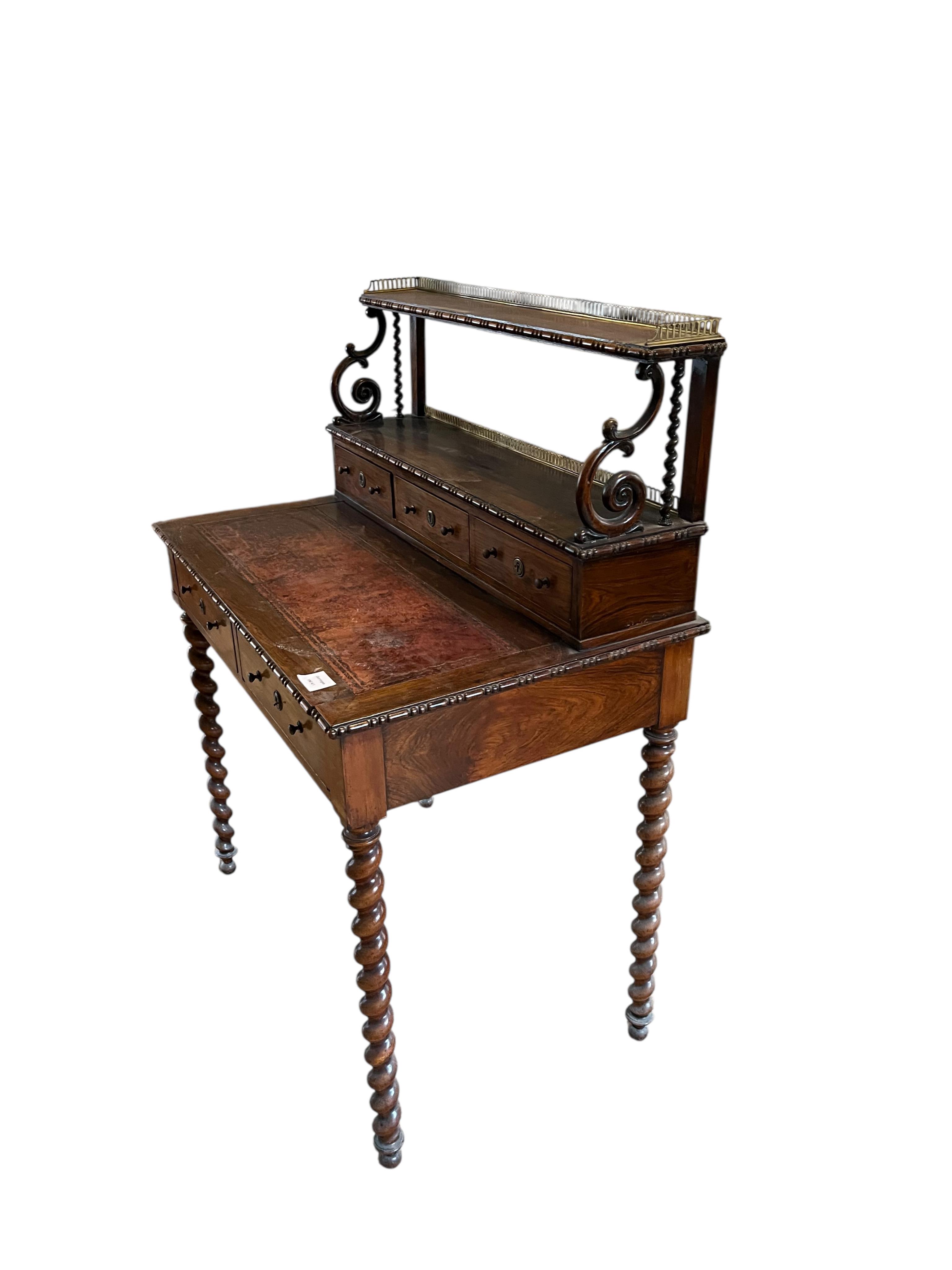 A 19th century Continental rosewood bonheur du jour, width 81cm, depth 52cm, height 110cm